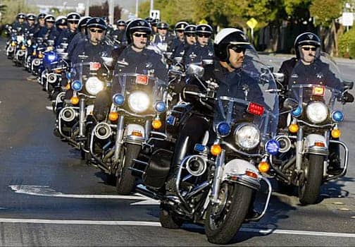 oakland-pd-funeral-motorcycle-cops-escort-sgt-mark-dunakin-in-tracy-032709-by-lance-iversen-sf-chron, ‘Oakland at war, a civil war, us against the authorities’, Local News & Views 