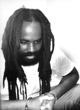 mumia-bw-contemplative-by-prison-radio, Citing withheld evidence, supporters of Mumia Abu-Jamal call for civil rights investigation, Abolition Now! 