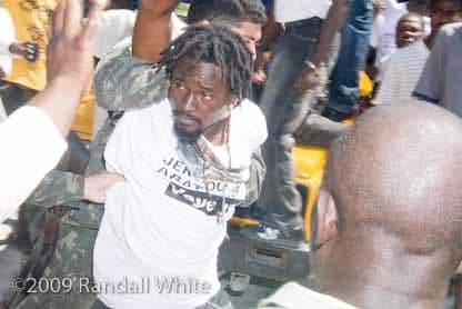 Fr.-Gerard-Jean-Juste-Haiti-funeral-Denis-Fernand-arrested-061809-by-c-2009Randall-White, ‘Thank you, Bill Clinton’: One more assassination by UN troops in Haiti, World News & Views 
