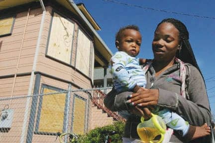 Tasha-Alberti’s-daughter-Sharquita-her-baby-Zmylan-foreclosed-evicted-West-Oakland-072109-by-David-Bacon, Foreclosed and evicted in West Oakland, Local News & Views 