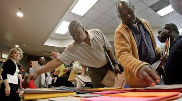 Black-unemployment-Johnnie-Daniels-Kerwin-Barber-at-job-fair-LA-by-Ric-Francis-AP, Black Caucus shuts down House vote, demands job creation, News & Views 