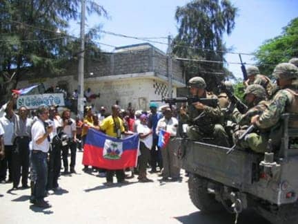 Haiti-U.S.-military-aiming-at-unarmed-Haitians-2004, Why the U.S. owes Haiti billions: The briefest history, World News & Views 