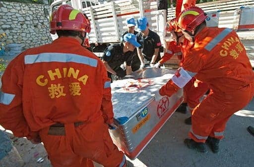 Haiti-earthquake-Chinese-search-rescue-teams-unload-equipment-by-AFP, The right testicle of hell: History of a Haitian holocaust, World News & Views 