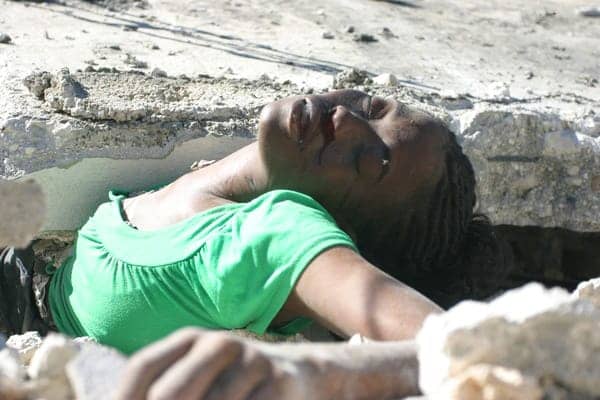 Haiti-earthquake-crushed-young-woman-011410-by-theparkerreport, How the U.S. impoverished Haiti, World News & Views 