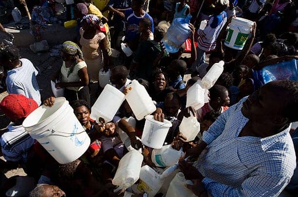 Haiti-earthquake-waiting-for-water-from-a-tanker-truck-0110-by-Timothy-Fadek-Polaris-for-TIME, The media called: Earthquake victims still await help, I say, World News & Views 