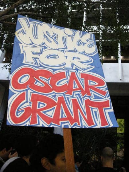Oscar-Grant-Mehserle-trial-rally-Justice-for-OG-sign-LA-00810-by-Lesley-Tiyesha-Phillips, Court hearing in Los Angeles for BART cop murderer of Oscar Grant, News & Views 