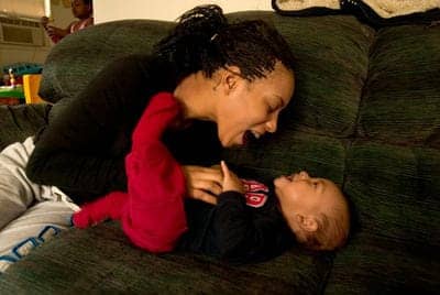 Alexis-Hutchinson-tickles-son-Kamani-11-mos.-122809-at-mom’s-Oakland-home-by-D.-Ross-Cameron-San-Jose-Mercury-News, Army to discharge single mom rather than court-martial her, News & Views 