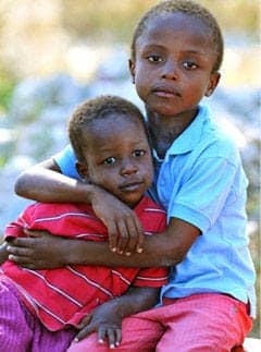 Haiti-earthquake-2-loving-boys-0210-by-Rex-Features, Hope rising from the ashes, World News & Views 