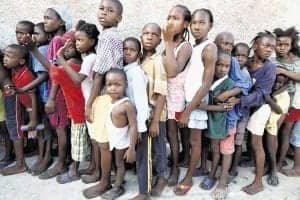 Haiti-earthquake-children-separated-from-families-line-up-for-food-PAP-0210-by-James-Oatway, Adoptees of Color say, ‘Stop all adoptions from Haiti’, World News & Views 