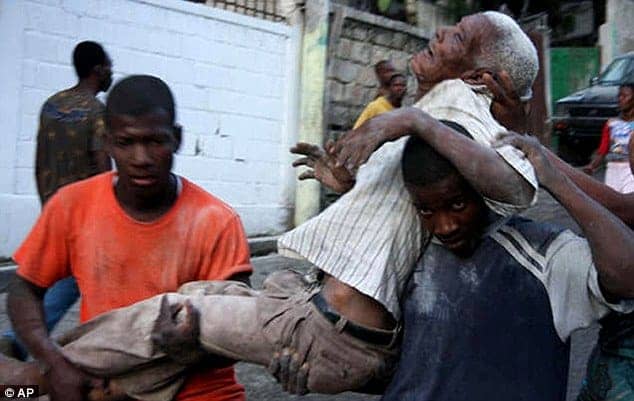 Haiti-earthquake-elderly-man-rescued-by-Haitians-0110-by-AP, Haiti help or Haiti hoodwink?, World News & Views 