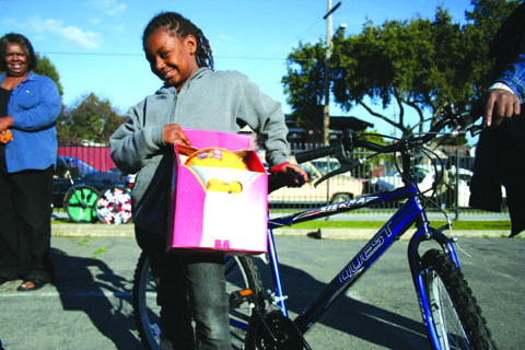 8th-annual-all-of-us-or-none-bike-giveaway-in-east-oakland-by-jr, Holiday events and gifts to uplift, Culture Currents 