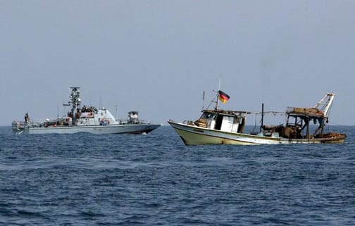 gaza-fishing-boat-threatened-by-israeli-gunboat-082508-by-reuters, The open-air prison called Gaza Strip, World News & Views 