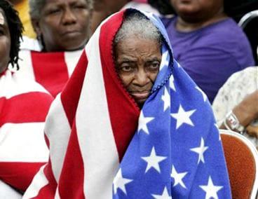 http://www.sfbayview.com/wp-content/uploads/new-orleans-flag-wrapped-women-post-katrina.jpeg