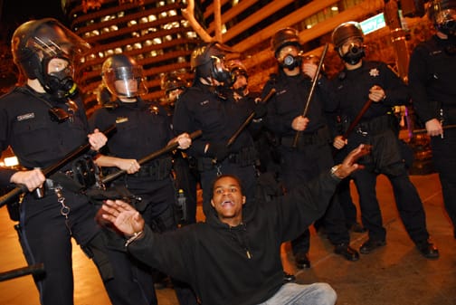 oscar-grant-rebellion-white-cops-black-protester-by-jay-finneburgh-indybay-web, Oakland’s not for burning?, Local News & Views 